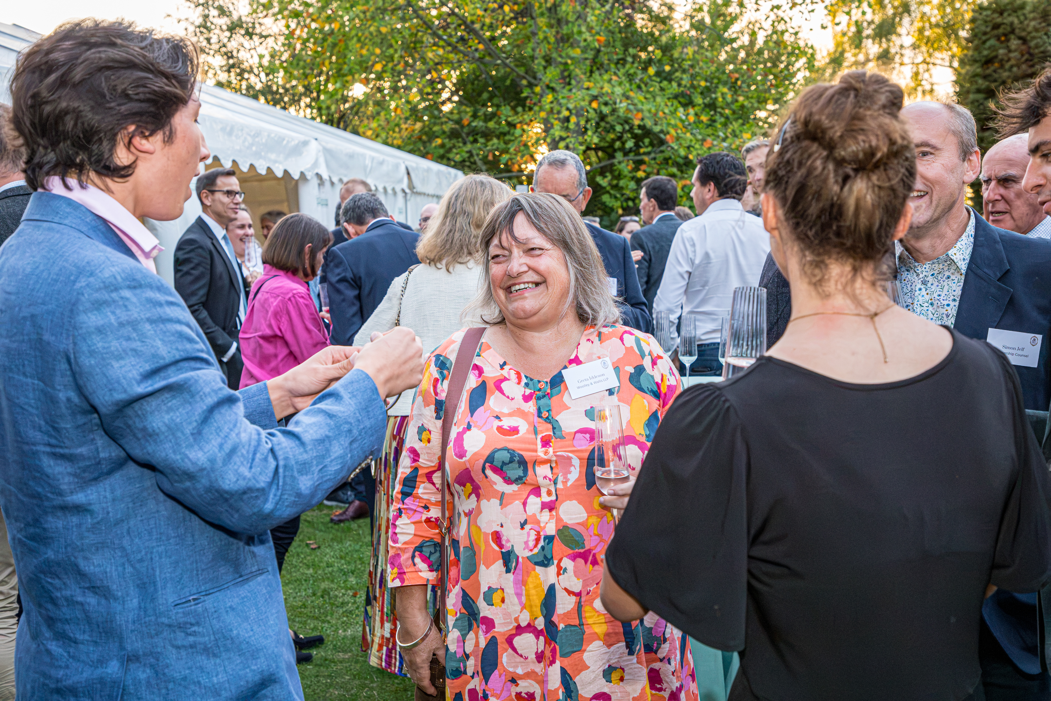 Noah entertaining guests during an outdoor summer event